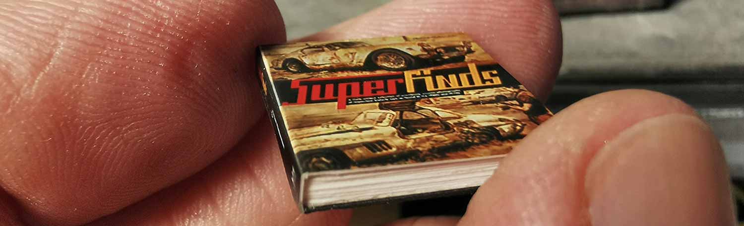 miniature book on classic cars