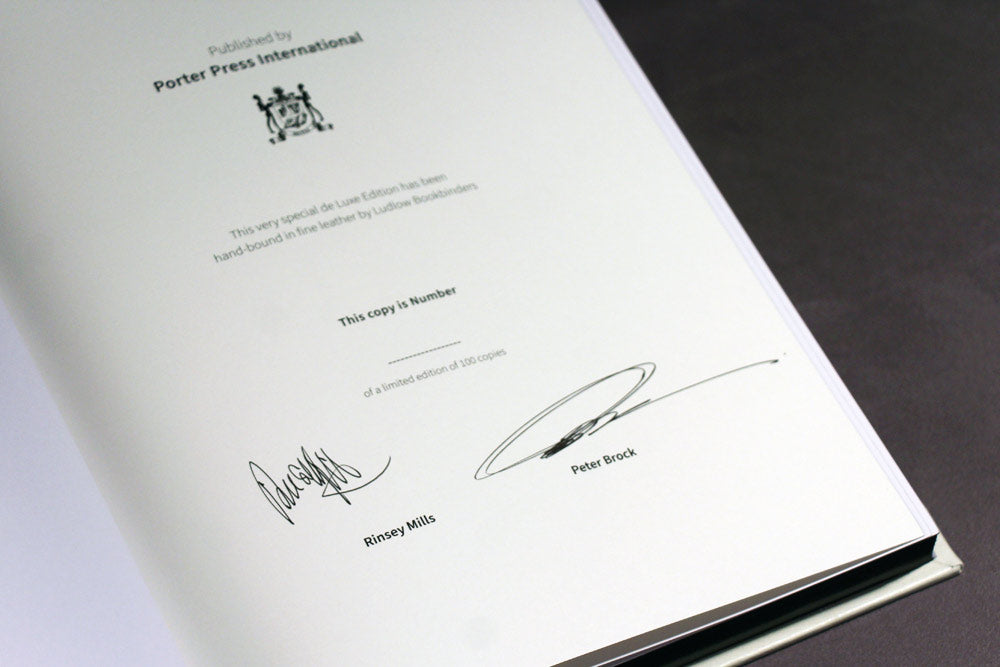 Rinsey Mills and Peter Brock signatures in Shelby Cobra book