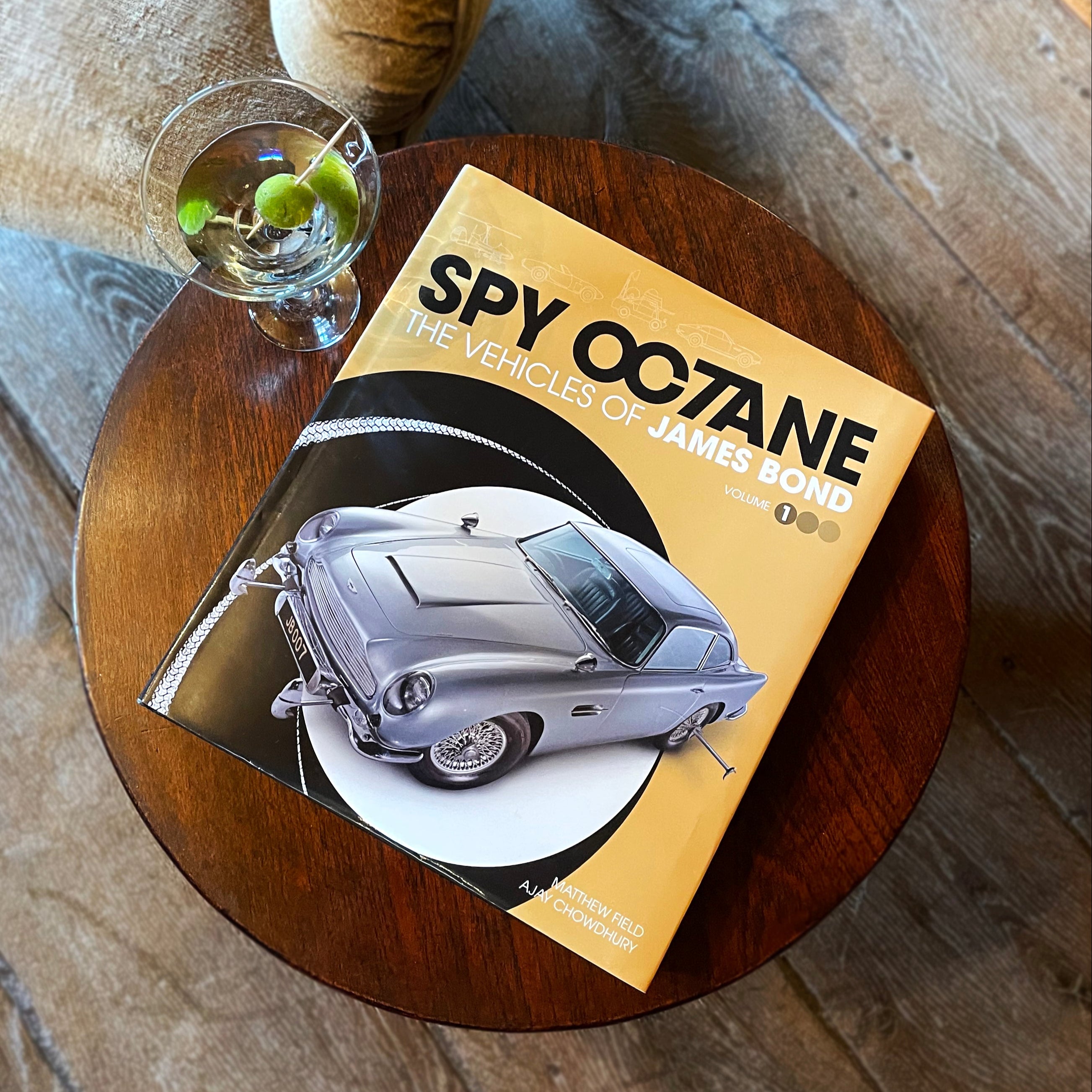 Spy Octane book on a table with a Martini