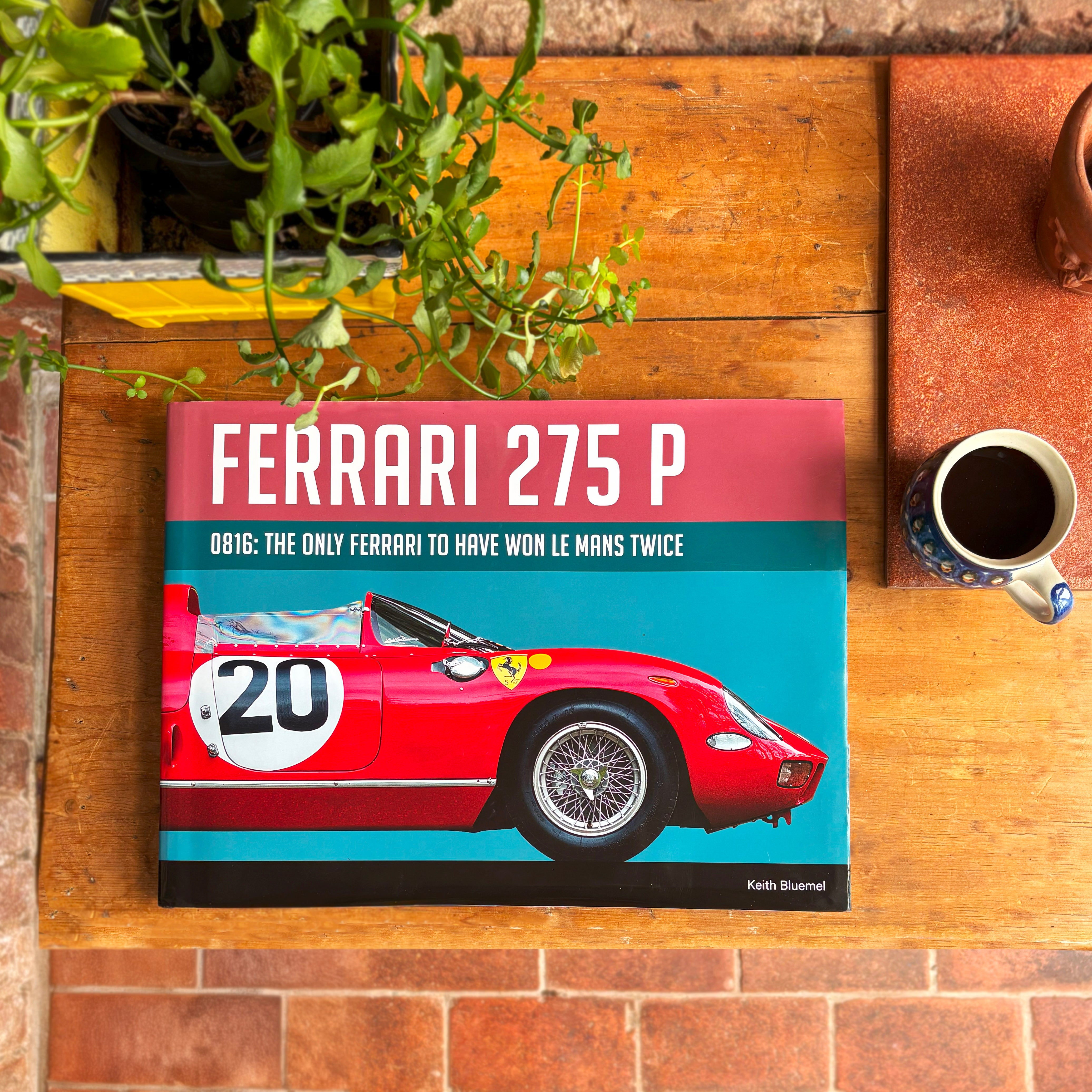 Ferrari 275 P 0816 book on a table