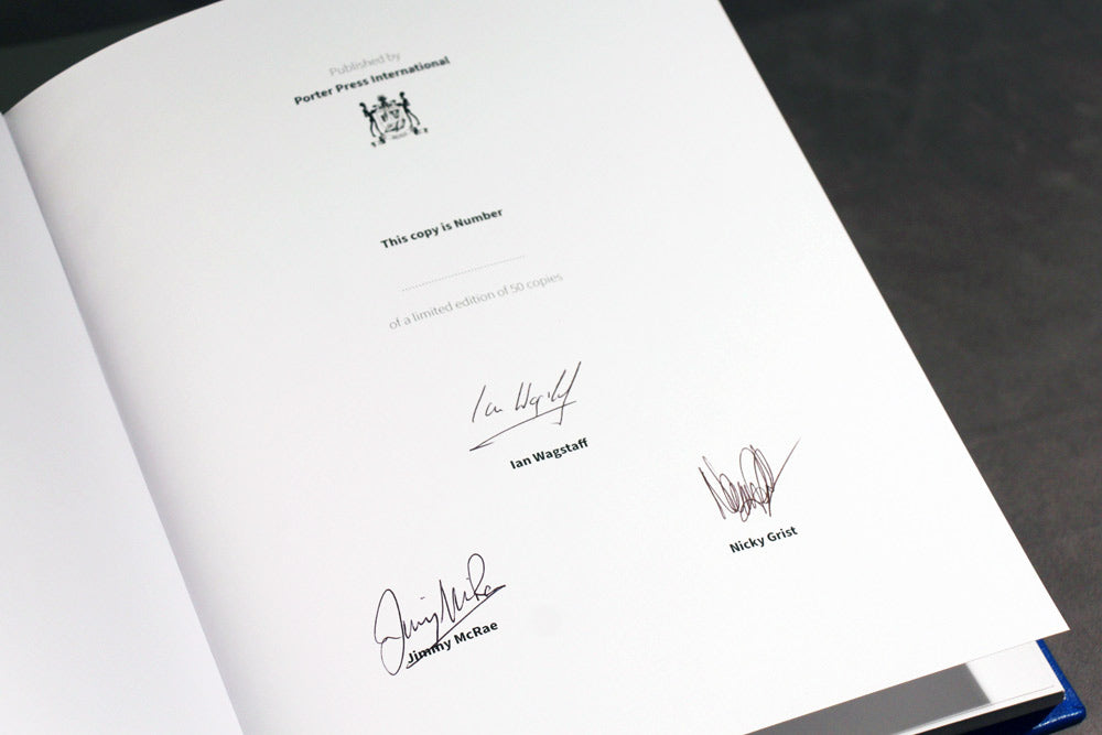 Nicky Grist and Jimmy McRae signed Subaru book