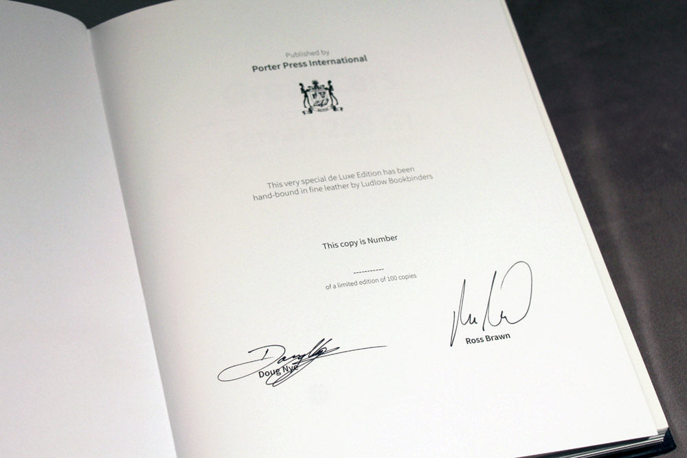 Signed by Doug Nye and Ross Brawn